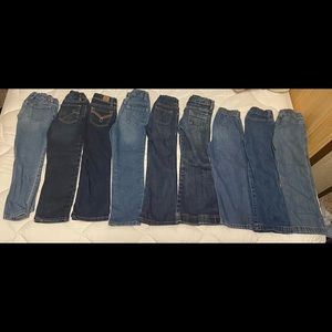 9 pairs of size 5 girls/toddler jeans